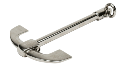 A shiny metal anchor lying diagonally on a black background in a studio setting with soft lighting
