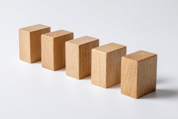 Five light wooden blocks in a diagonal, descending line on a clean white background. Minimalist composition for concepts of decline, steps, or progression.
