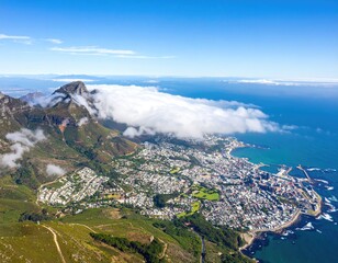 Aerial view of Cape Town city sprawling between mountains and ocean