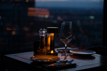View from a restaurant on a skyscraper with panoramic windows in the evening
