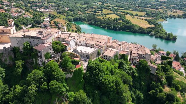 Italy, July 3, 2025: Panoramic aerial view from the drone of the village of Barrea located in a mountainous area pertaining to the Alto Sangro basin and Lake Barrea in the province of L'Aquila