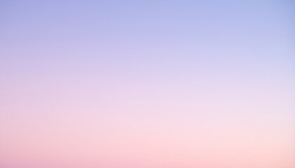 桃色から水色へ続く朝の空