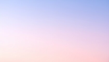 桃色から水色へ続く朝の空