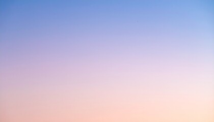 桃色から水色へ続く朝の空