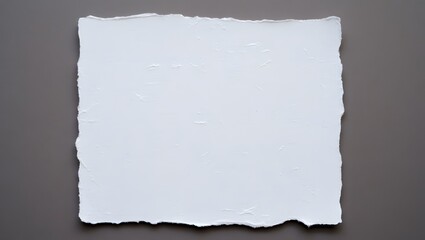 Isolated white torn paper on gray background for mockup and design element usage