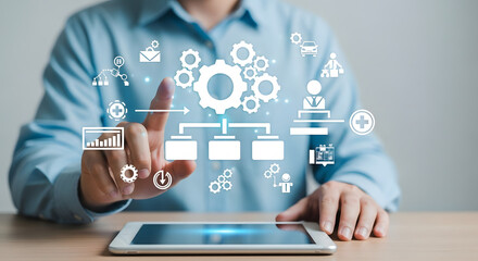 Businessman virtually automating complex business processes using tablet technology for efficiency and digital transformation