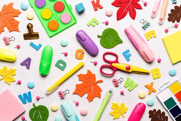 Seamless pattern with colorful stationery set on white background. Back to School concept background, top view.
