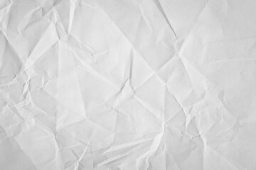 Crumpled light grey paper backdrop texture