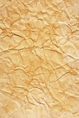 Old grunge crumpled yellowed parchment paper texture with dirty brown stain