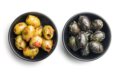 Tapas. Flavored pickled olives in bowl isolated on white background.