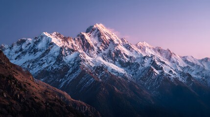 Breathtaking wide angle shot of snow capped mountain range sunrise golden hue spreading across sky soft pink light touching peak clean white background contrast majestic ruggedness of mountain
