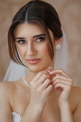 Bride prepares for wedding ceremony with elegant accessories and heartfelt expression