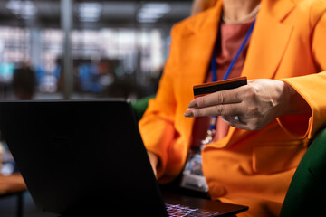 General manager using her card to purchase clothes and treat herself, solving bills payment and...