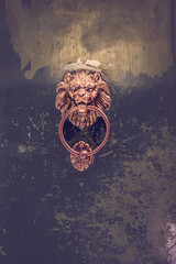 Lion Head Door Knocker On A Door In An Alleyway Of Caruggi ( Old Town ) In Genoa, Italy