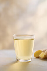 Zesty Ginger Lemon Vinegar Wellness Shooter on Rustic Surface