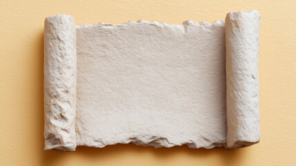 Empty vintage scroll parchment with textured edges rolled at both ends, placed on a soft yellow background, concept of stationery or paper goods