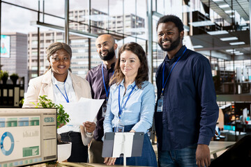 Multinational company employees meet to plan a project focused on growth, discussing resource...