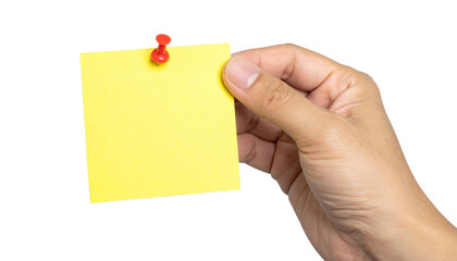 A hand holding a yellow sticky note with a red push pin attached