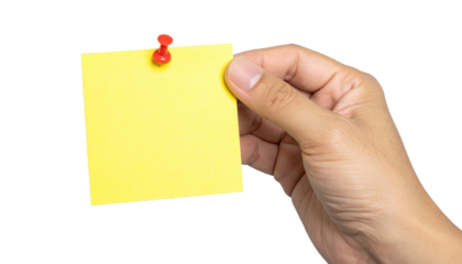 A hand holding a yellow sticky note with a red push pin attached
