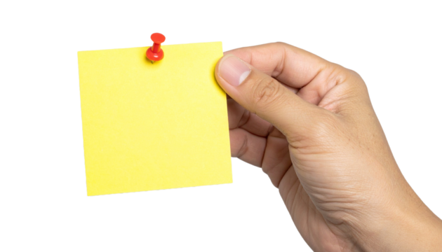 A hand holding a yellow sticky note with a red push pin attached
