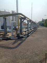 gas and oil industrial sites with large pipes and the latest technology