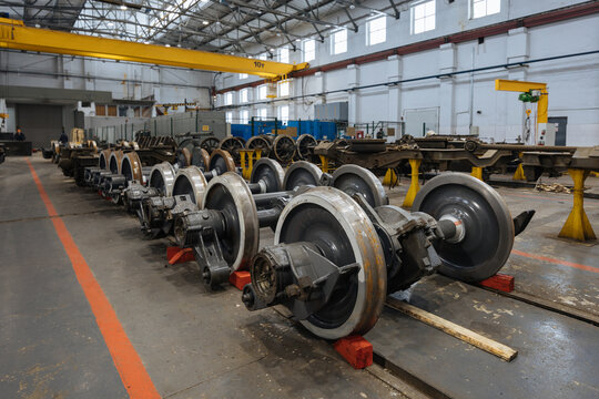 Steel train wheels at service in wagon repair workshop