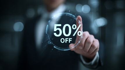 A persons hand is shown touching a futuristic interface displaying a 50 off promotion