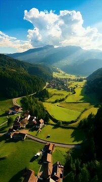 Aerial View of Mountain Village in Summer Light
