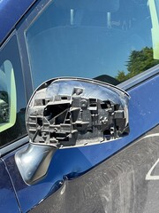 Damaged drivers mirror