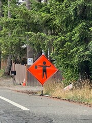 Construction flagger sign