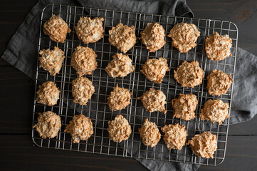 Baked Macaroons on a Wire Cooling Rack: Freshly baked coconut and meringue drop cookies cooling on a wire rack
