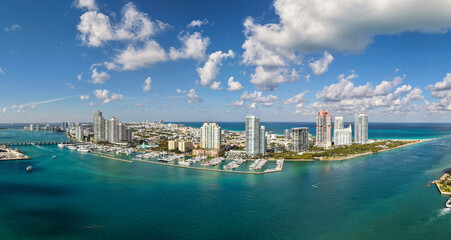 Iconic Miami coastline. Cloudy sky over Miami famous skyline.