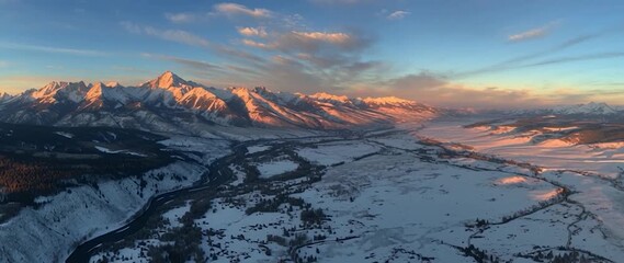 Anamorphic video Majestic sunrise over snow-capped mountains - Powered by Adobe