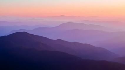 Fototapeta premium Purple mountain range landscape at sunrise or sunset scenic view background image