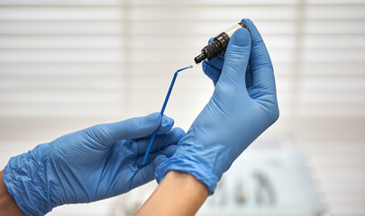 Dentist Applying Dental Bonding Agent with Precision Tool