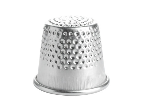 A silver thimble, a classic sewing accessory, isolated on a clean white background.