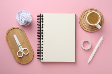 Flat lay composition with notebook on pink background