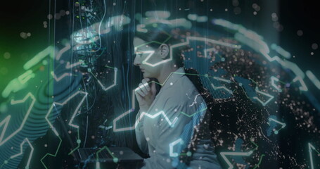 IT engineer in lab coat examining server racks, cables, LEDs and holographic globe in data center