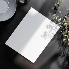 Elegant wedding card mockup placed flat on a black colored table, perfect for displaying printable invitation designs in a clean, minimal setting