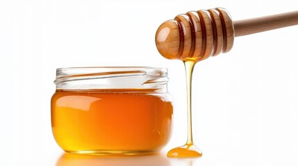 Sweet delight in a jar with wooden drizzler on white background