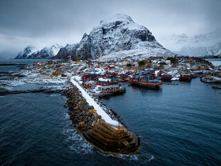 The Serene Winter Landscape of a Beautiful Coastal Village nestled in Norway, showcases