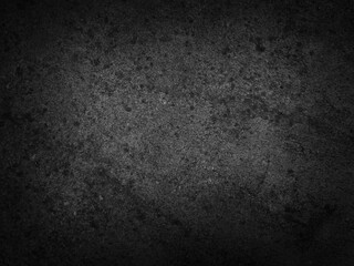 Black weathered cement surface texture. Dark concrete background