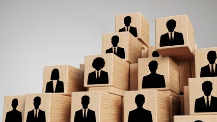 Wooden blocks show a business hierarchy, concept of organization structure