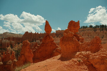 Giant rock spire and natural red rock hoodoos in Navajo Trail and combination loop at Bryce Canyon...