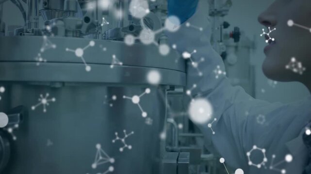 Lab tech turning valve key loosening clamp for port inspection in pharma lab with molecules