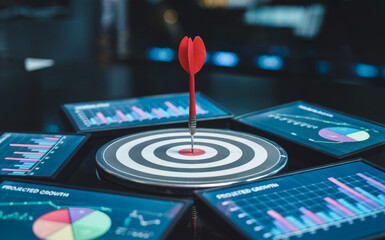 Fototapeta premium A professional marketing and analytics concept image featuring a red dart hitting the bullseye of a large circular target board with concentric gray and white rings.