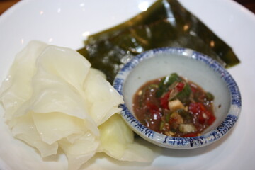 Korean food Steamed Cabbage with Sea Kelp and Fermented Seafood Sauce
Wrap rice in steamed cabbage leaves and eat it