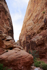 Narrow sandstone slot canyon passage at Capitol Reef National Park