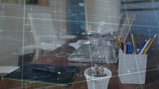 Digital grid overlay starting camera zoom, revealing laptop tablet plant pencil holder for demo
