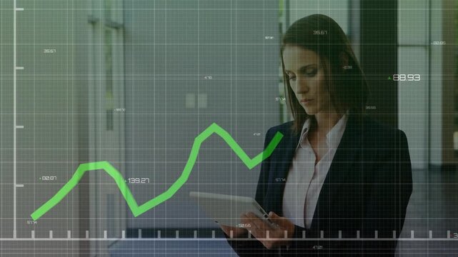 Businesswoman tapping tablet and analyzing grid overlay and line graph fluctuating business data